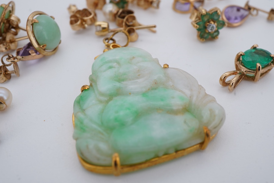 A collection of earrings and two pendants, comprising: two pairs and one single diamond studs, each set with a brilliant-cut diamond weighing approximately 0.07 carats; a pair of emerald and diamond cluster stud earrings